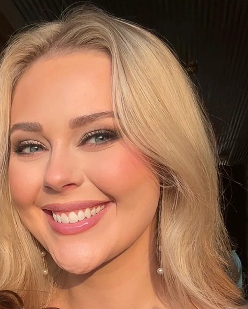 Haley Fox smiling in warm evening light